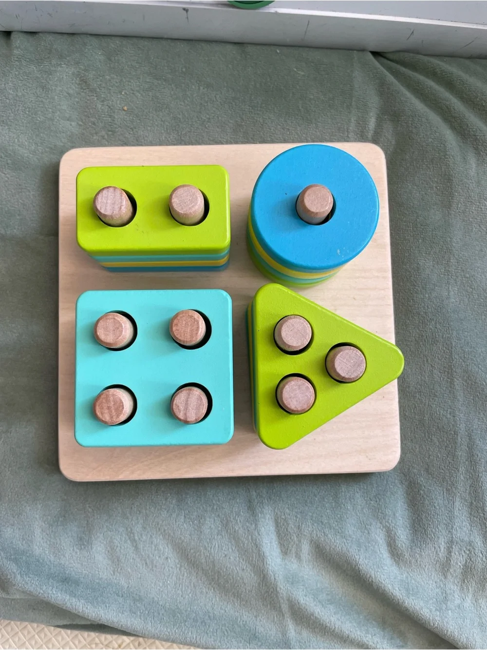 Wooden Shape Sorting & Stacking Toy in Blue and Lime Puzzle